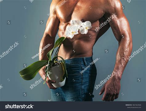 Shirtless Athletic Naked Guy Holds Orchid Stock Photo Edit Now 1867463506