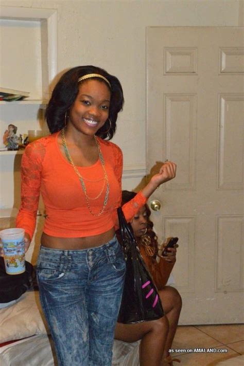 Amateur Ebony Hottie Posing In Various Sexy Outfits