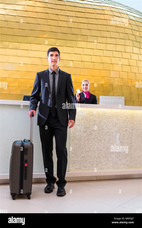 man departing  business trip  hotel reception stock photo alamy