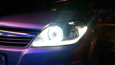 Тюнинг - комплект фар с ксеноном ангельские глазки для Опель Астра Х ...