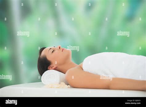 Beautiful Brunette Relaxing On Massage Table Stock Photo Alamy
