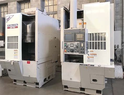 Okuma And Howa 2sp V40 Twin Spindle Cnc Vertical Turning Center Great