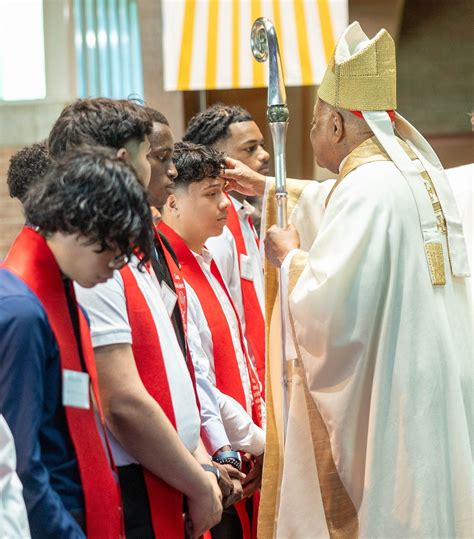Don Bosco Cristo Rey students receive Sacraments of Initiation during