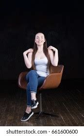 Busty Woman Sitting On Chair Over 227 Royalty Free Licensable Stock