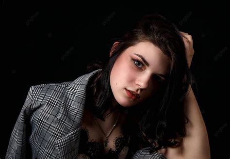 Studio Portrait Of A Stunning Brunette Woman In Her Youth Photo Background And Picture For Free