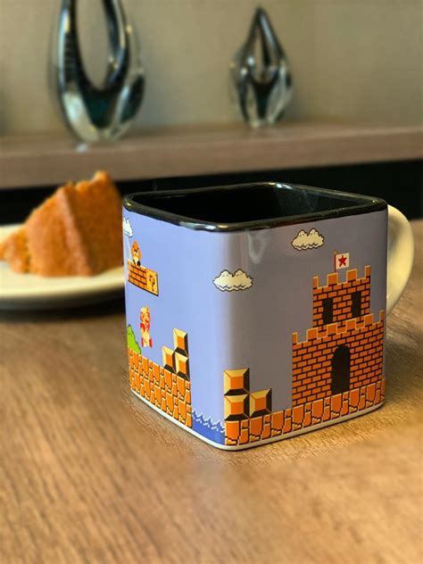 Caneca Cubo Mario Fases Pixels Super Mario Bros 300ml Toyshow