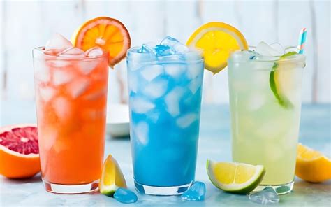 Cold Orange Ade Grapefruit Ade And Blue Lemonade In Glasses Premium