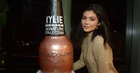 Kylie Jenner Covers Up In Gold Dress After Lounging Poolside In Tiny Bikini Mirror Online