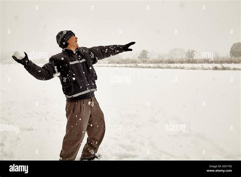 Man Throwing Snowball Hi Res Stock Photography And Images Alamy