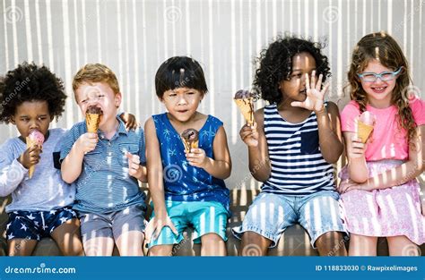 Kids Eating Ice Cream in the Summer Stock Photo - Image of cone ...