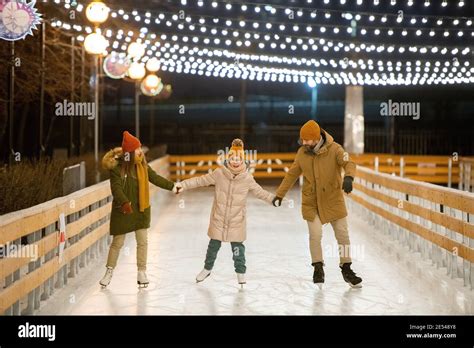 family  fun  skating rink  teaching  child  skate
