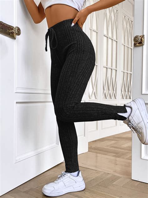 SHEIN EZwear Leggings Con Nudo Delantero Bajo Con Abertura Tejido De