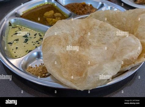 Burmese Naan Flatbread Served With A Variety Of Dipping Sauces Stock