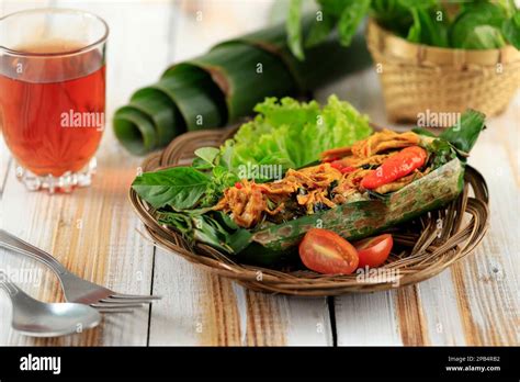 Nasi Bakar Ayam Kemangi Steamed Rice With Stir Fry Spicy Shredded