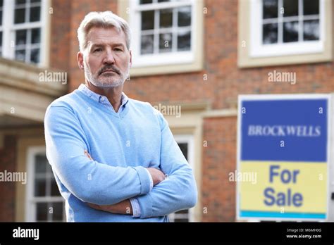 Mature Man Forced To Sell Home Through Financial Problems Stock Photo Alamy