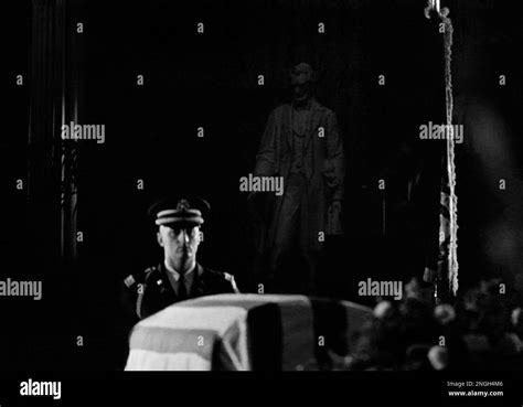 The statue of Abraham Lincoln in the Capitol rotunda looks down on the ...