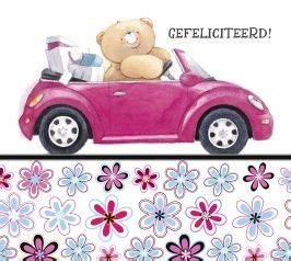 A Pink Car With A Teddy Bear In The Passenger Seat And Flowers On The Side