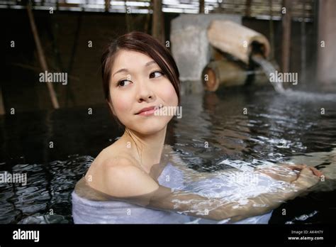 Woman Soaking In Hot Tub Stock Photo Alamy