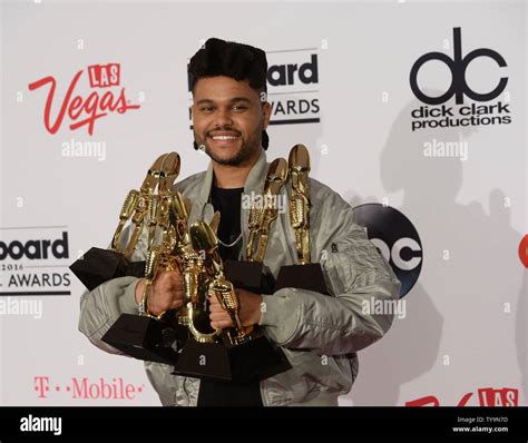 Singer The Weeknd Appears Backstage With His 8 Awards For Top Hot 100