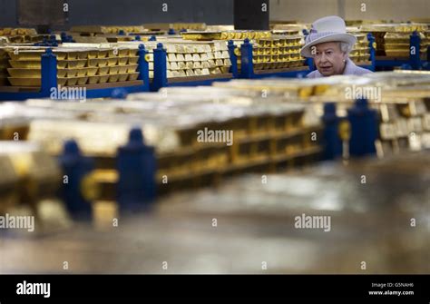 Queen Elizabeth Ii Tours The Gold Vault During Her Visit To The Bank Of