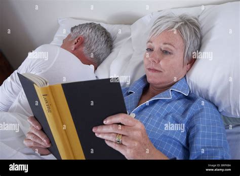 Mature Couple In Bed Stock Photo Alamy