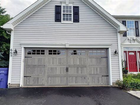 Stamped Carriage House Garage Door In Driftwood Accents Woodtones