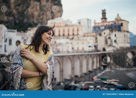 Italian Young Woman Enjoying Beautiful Sunset In Amalfi On Amalfi Coast