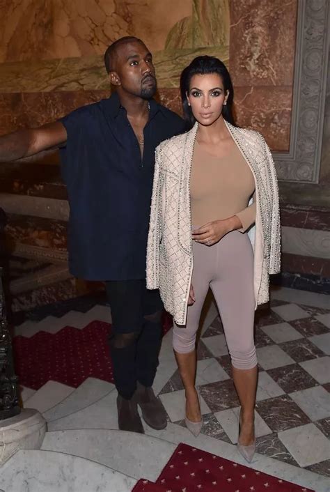 Kim Kardashian Covers Up In Skintight Nude Top After Baring Her Boobs Earlier In The Day Irish