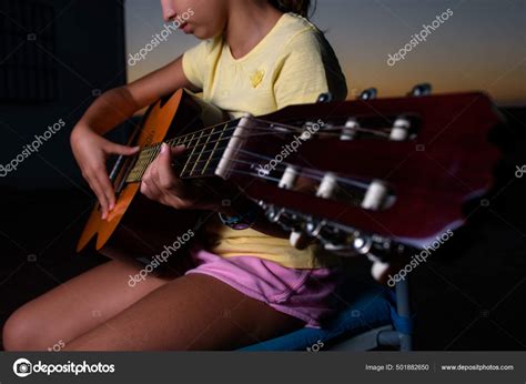 Brunette Girl Playing Acoustic Guitar Outdoors Sunset Close Guitar Headstock Stock Photo By