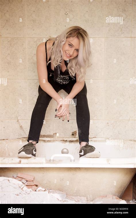 Beautiful Blonde Girl In An Abandoned House Stock Photo Alamy