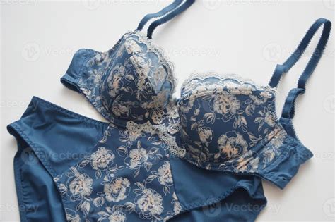 Lingerie Blue Bra And Silk Panties With A Pattern On A White Background Fashionable Colored