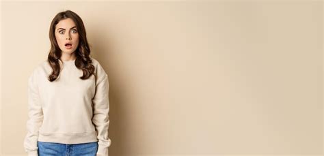 Free Photo Portrait Of Shocked Brunette Woman Drop Jaw Gasping And Staring Speechless At