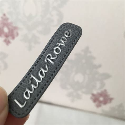 China Custom Embossed Hot Stamping Leather Label Factory Manufacturers And Suppliers Yilang