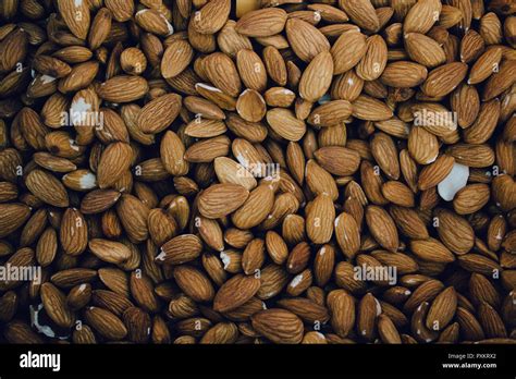 Background Of Big Raw Peeled Almonds Top View Stock Photo Alamy