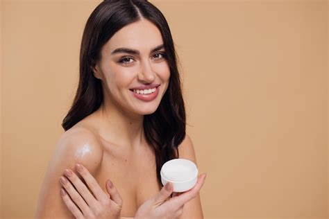 Premium Photo Beauty Portrait Of Laughing Beautiful Half Naked Woman Smiling And Applying Face