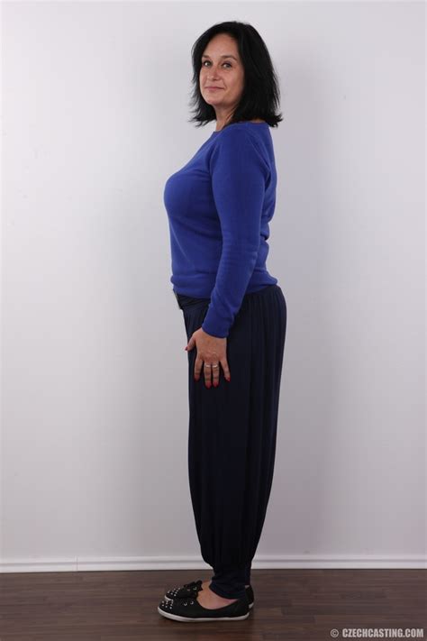 Mature Chick Slowly Gets Naked As She Takes XXX Dessert Picture