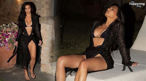 Kim Kardashian Shows Off Her Assets In A Black Bikini Photos