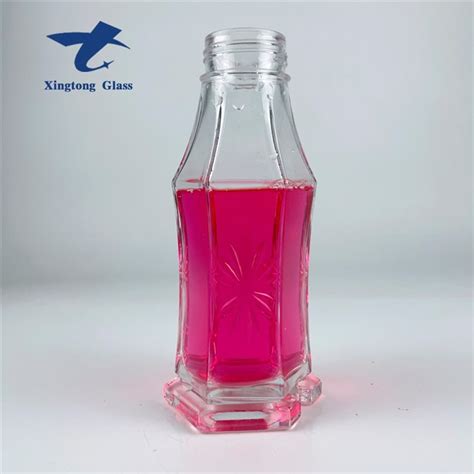 China Empty Glass Hot Sauce Bottle With Lid Manufacturers Suppliers Factory Xingtong