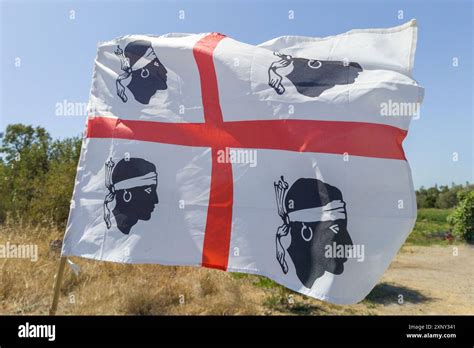 Sardinian Flag Waving In Rural Landscape Stock Photo Alamy