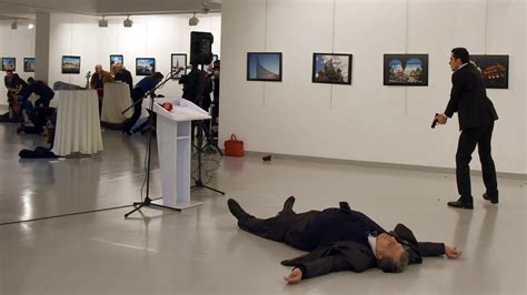 Photographer Burhan Ozbilici Describes Moment He Captured Assassination