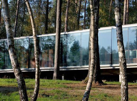 A Modern Forest House Built From Glass Iron And Wood Structure In Ottignies Belgium