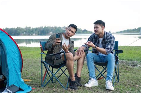 Happy Asian Male Gay Couple On Camping Together In A Forest Romantic Vocation Trip Stock Image