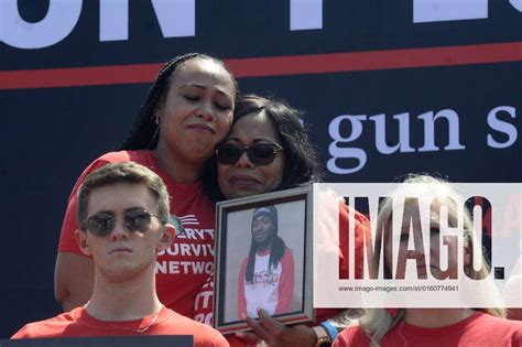 Two Attendees Embrace During A Rally With Everytown For Gun Safety