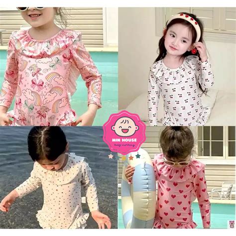 8 35kg dưới 1m35 Đồ bơi bikini liền thân tay dài phối bèo hoạ tiết tim xinh xắn cho bé gái