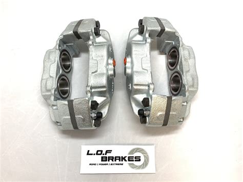 Defender Front Vented Calipers Pair Stainless Pistons Lof Clutches