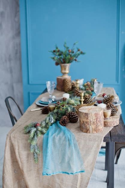 Premium Photo | Christmas table with rustic decorations