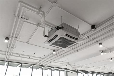 Modern White Ceiling Mounted Cassette Type Air Conditioner In Office