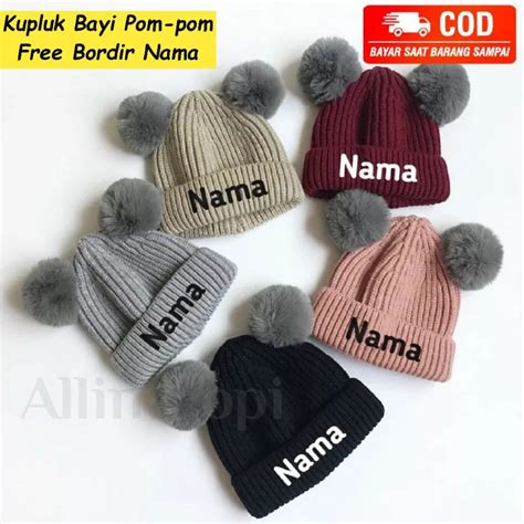 jual kupluk bayi pom pom lucu  bordir namakupluk bayi pom pom
