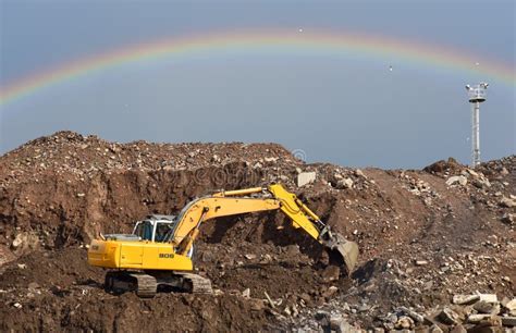 Excavator At Landfill For Work Concrete Demolition Waste Salvaging And