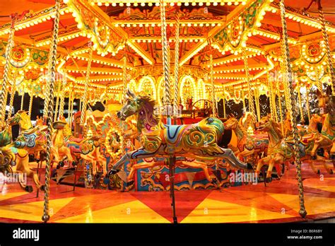 Colorful Carousel With Lights At Night Stock Photo Alamy